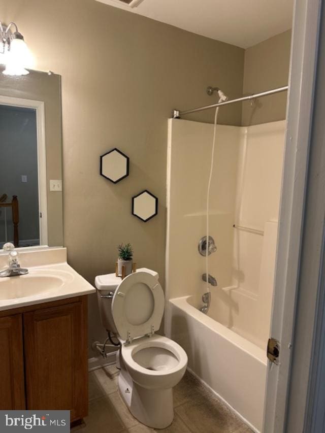 full bathroom with toilet, tile patterned floors, tub / shower combination, and vanity