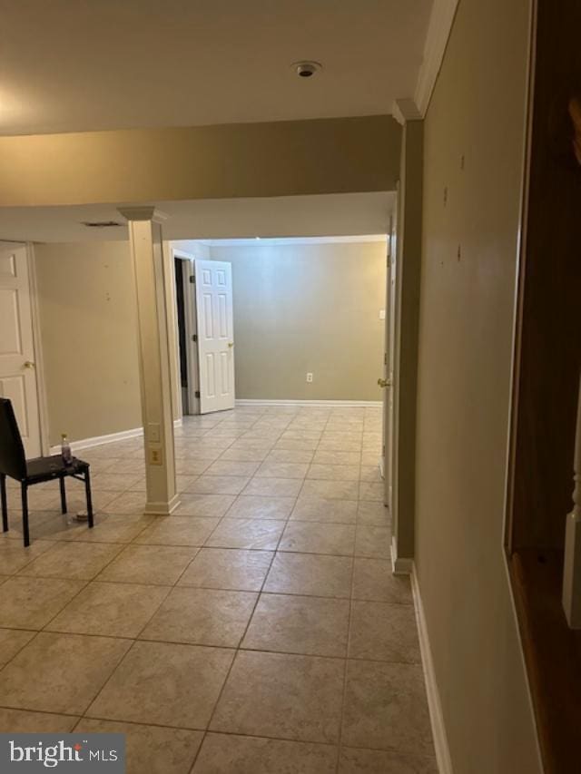 hallway featuring light tile patterned flooring