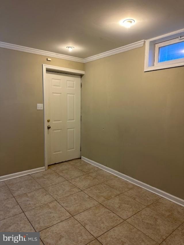 doorway featuring crown molding