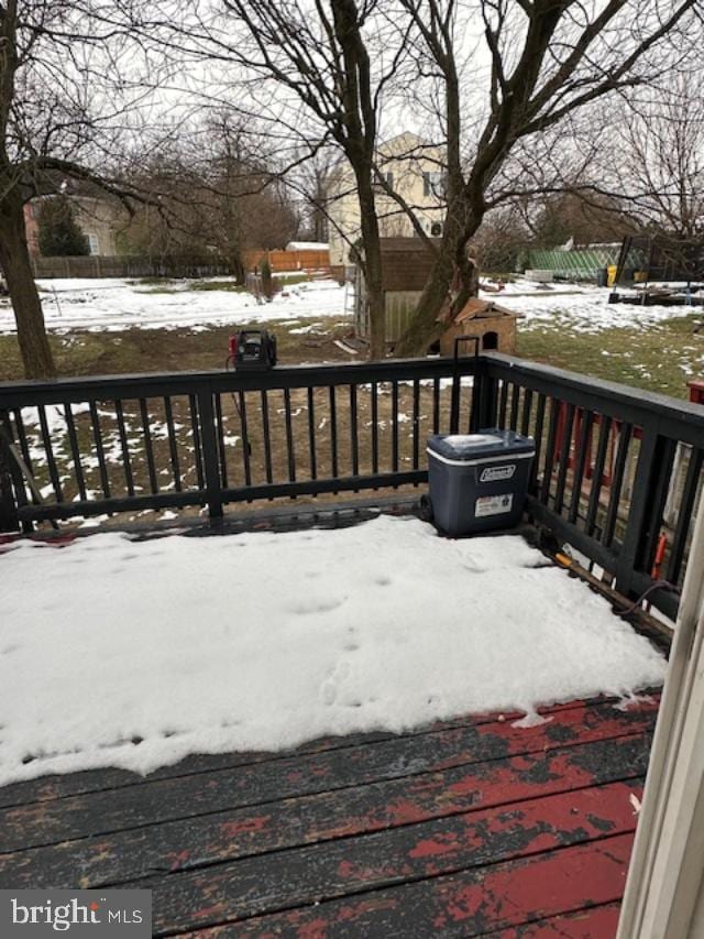 view of snow covered deck