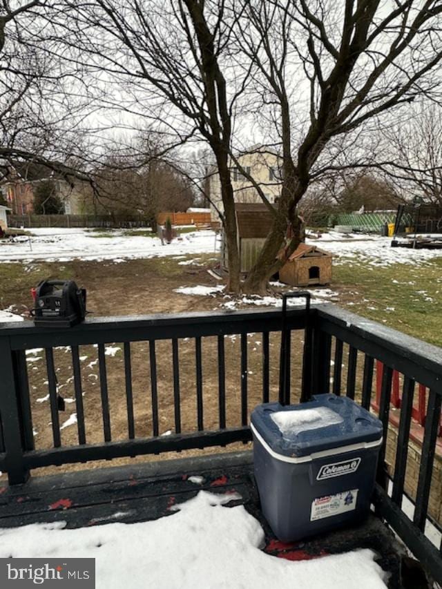 view of snow covered deck