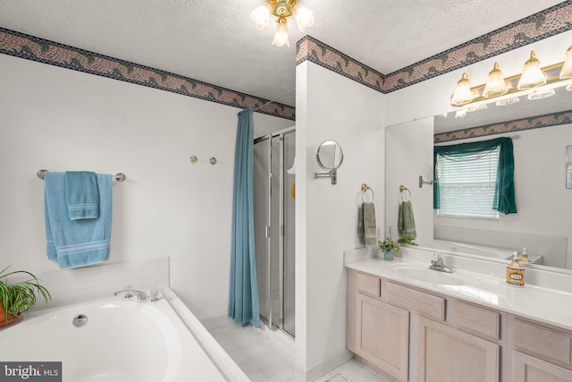 bathroom featuring tile patterned floors, a textured ceiling, and independent shower and bath