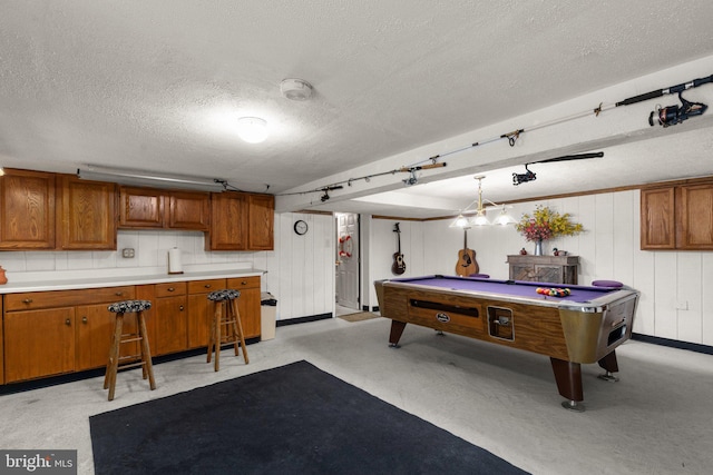 rec room with a textured ceiling and pool table