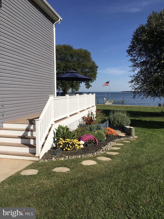 view of yard with a water view