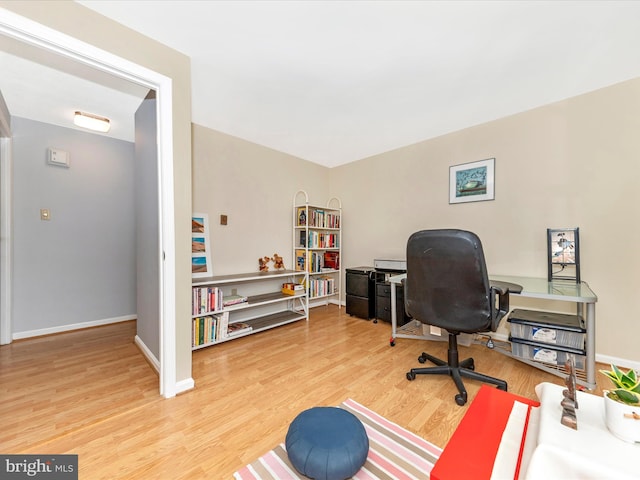 office featuring hardwood / wood-style floors