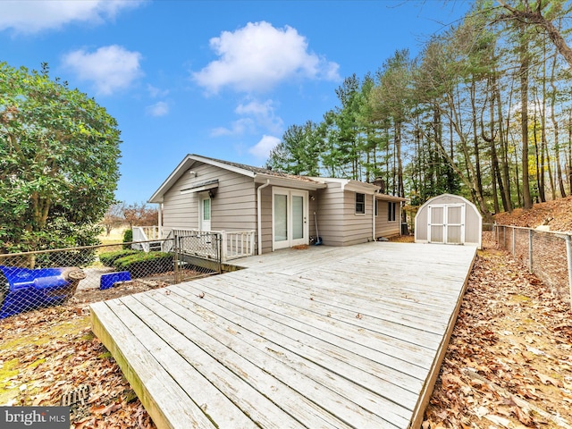 wooden deck with a shed