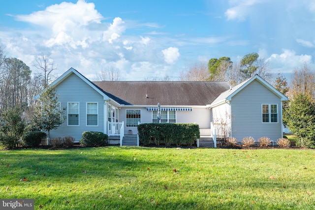 ranch-style home with a front yard