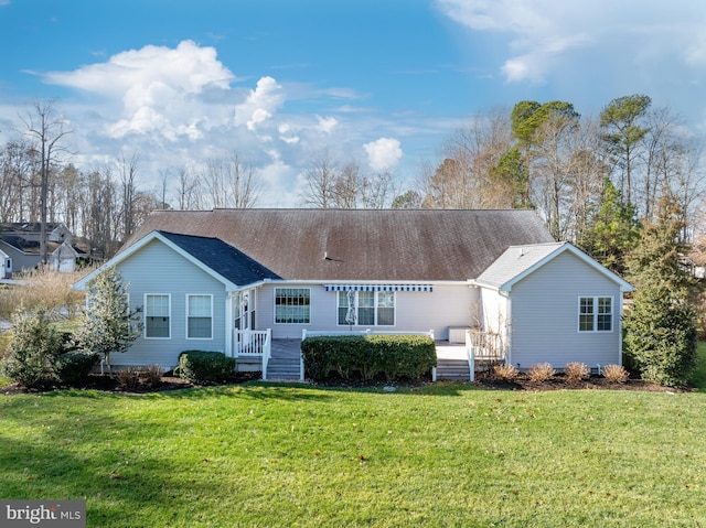 view of front facade featuring a front yard