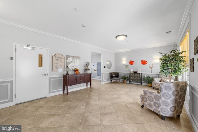 living area featuring ornamental molding