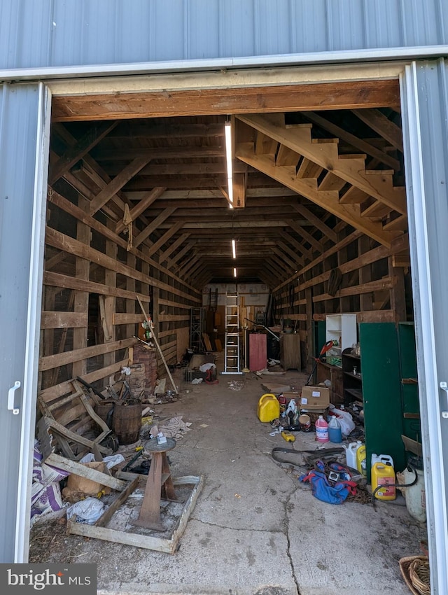 miscellaneous room featuring lofted ceiling