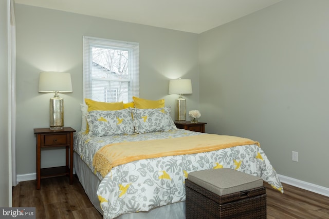 bedroom featuring dark hardwood / wood-style flooring