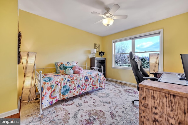 bedroom with ceiling fan and carpet floors