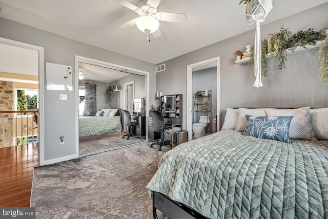 bedroom with hardwood / wood-style floors, ceiling fan, and a closet