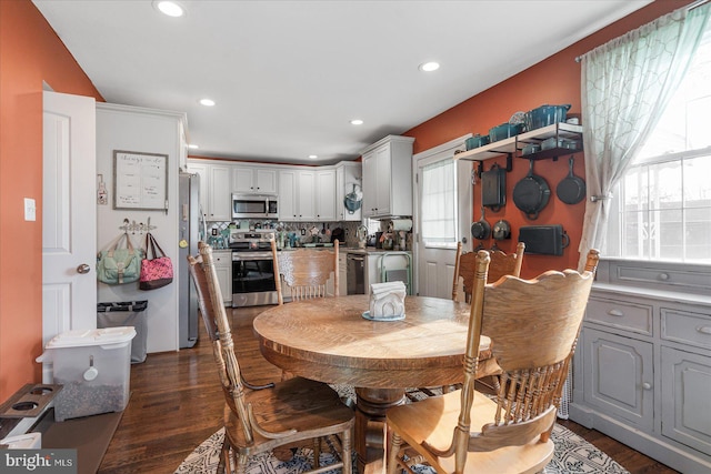 dining space featuring dark hardwood / wood-style floors