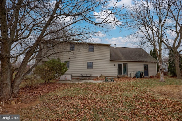 back of property featuring a patio area