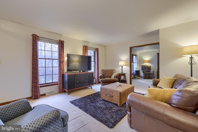 living room with light colored carpet