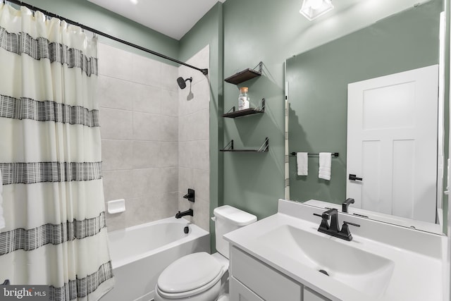 full bathroom featuring vanity, toilet, and shower / bathtub combination with curtain