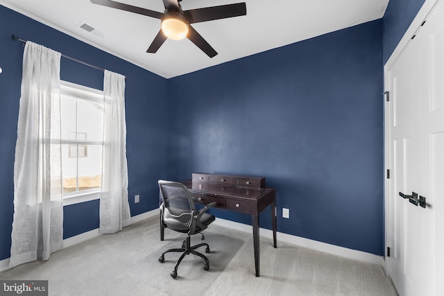 carpeted office featuring ceiling fan