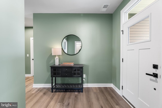 foyer featuring wood-type flooring