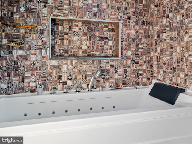 bathroom featuring a washtub