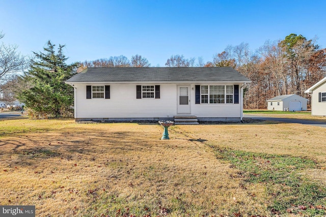 ranch-style home featuring a front lawn