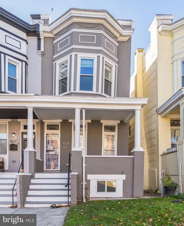 829 Chauncey Ave, Baltimore, MD 21217 - multi unit property featuring a porch and brick siding