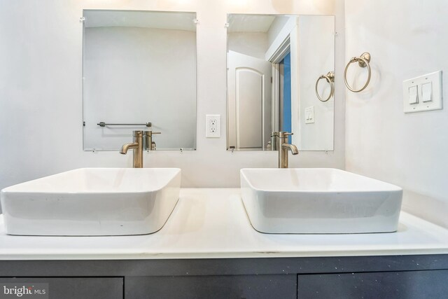 829 Chauncey Ave, Baltimore, MD 21217 - full bathroom featuring double vanity