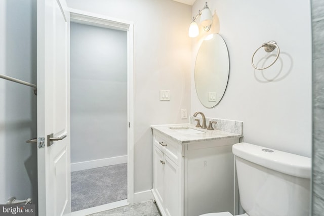 829 Chauncey Ave, Baltimore, MD 21217 - bathroom featuring vanity, toilet, and baseboards