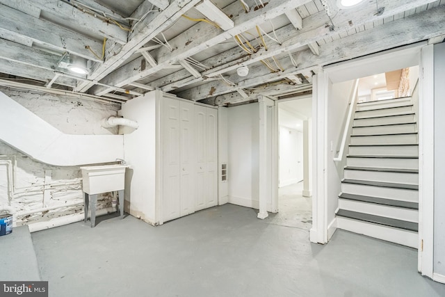 829 Chauncey Ave, Baltimore, MD 21217 - unfinished below grade area with stairway and a sink