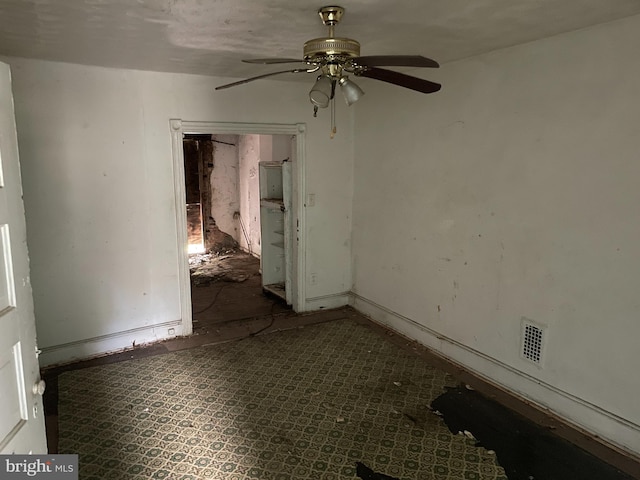 spare room featuring ceiling fan