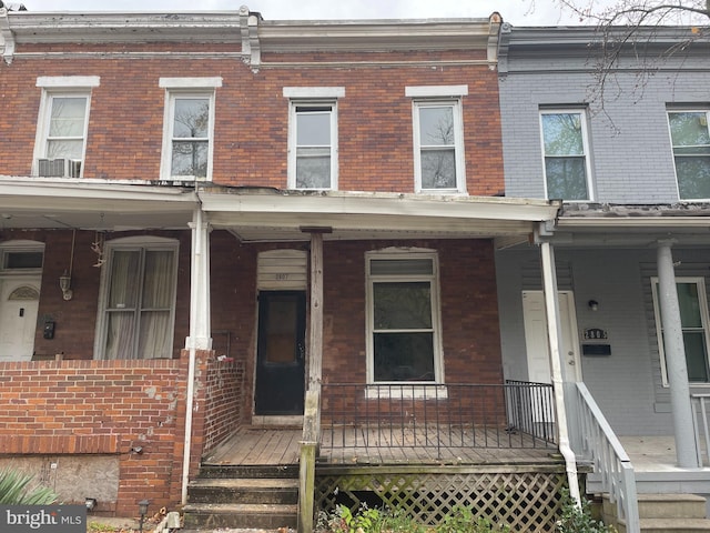 view of property with a porch