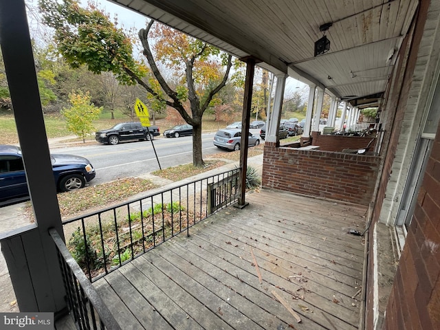 wooden terrace with covered porch