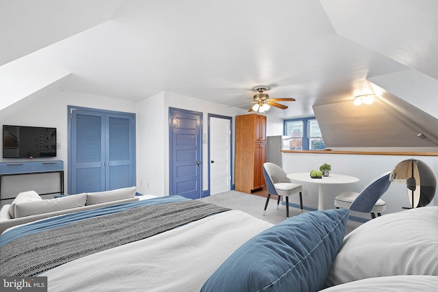 bedroom featuring ceiling fan and light colored carpet