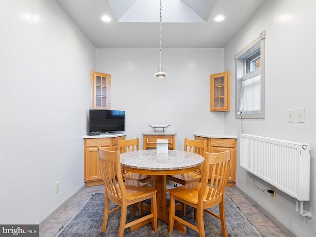 dining room featuring radiator heating unit