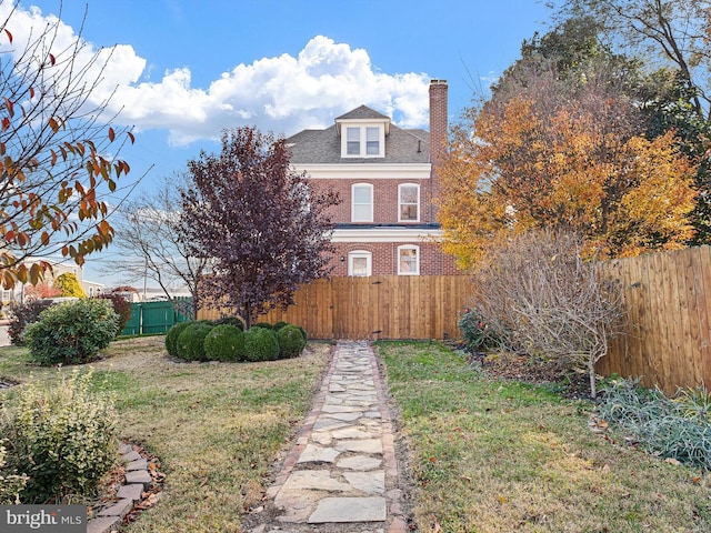 exterior space featuring a front lawn