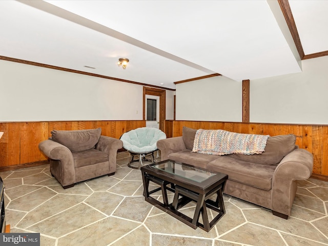 living room with ornamental molding