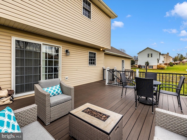 deck with a fire pit