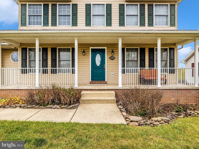 view of front of home featuring covered porch