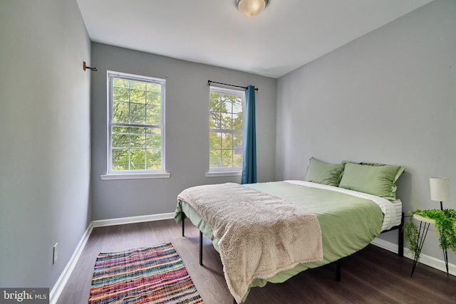 bedroom featuring dark hardwood / wood-style floors