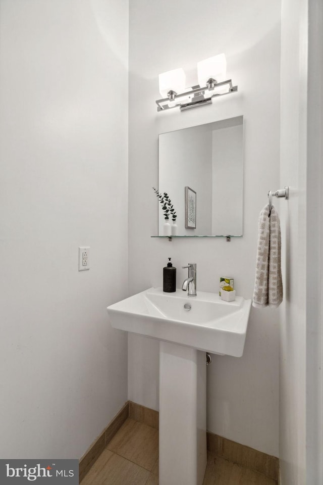 bathroom featuring tile patterned floors and sink