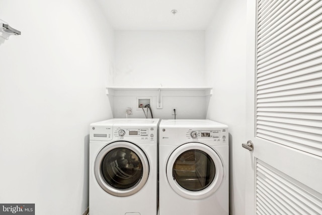 washroom featuring separate washer and dryer