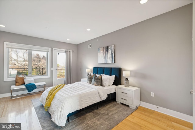 bedroom featuring hardwood / wood-style floors