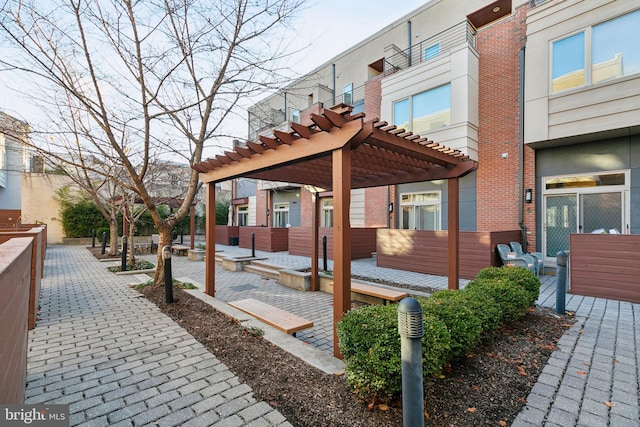 view of home's exterior featuring a pergola