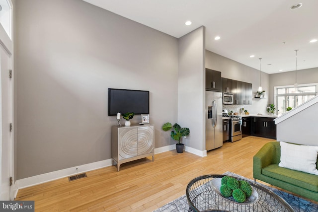 living room with light wood-type flooring