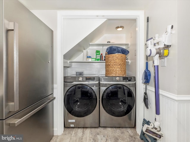 laundry room with washer and clothes dryer