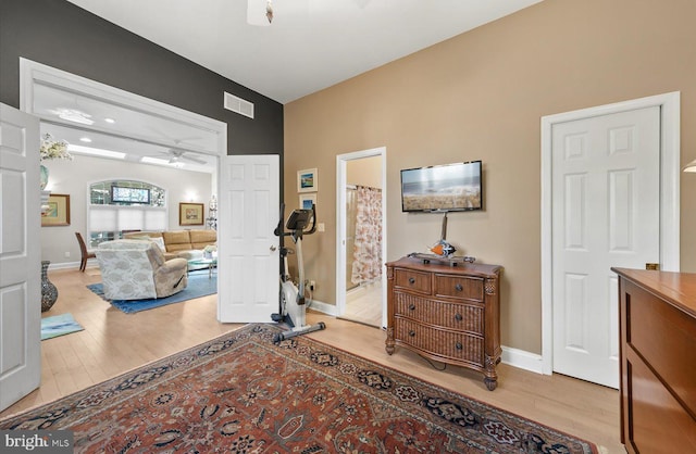 entrance foyer featuring ceiling fan and light hardwood / wood-style floors