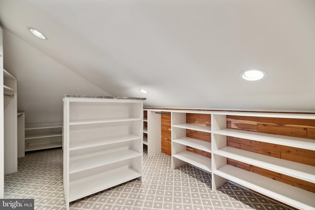 spacious closet with lofted ceiling