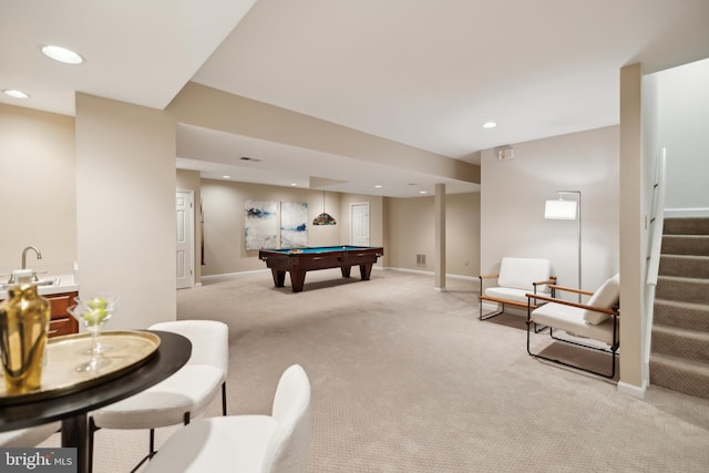 recreation room featuring sink, pool table, and light carpet