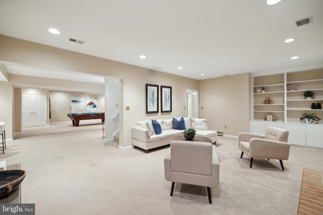 living room featuring light carpet and pool table