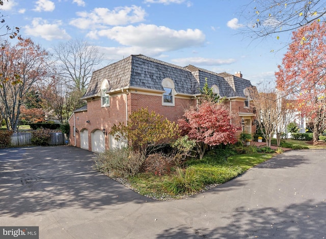 view of home's exterior with a garage